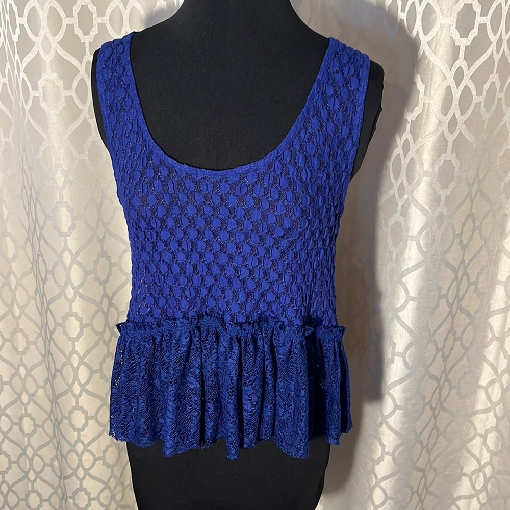 Blue women’s top from Joe Boxer Size XL. Button back/see through top.